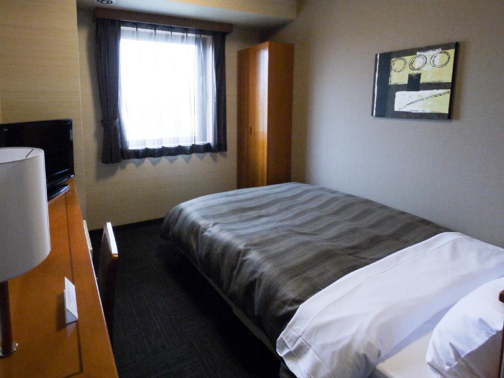Hotel Route-Inn Yonezawa Ekihigashi Bagian luar foto