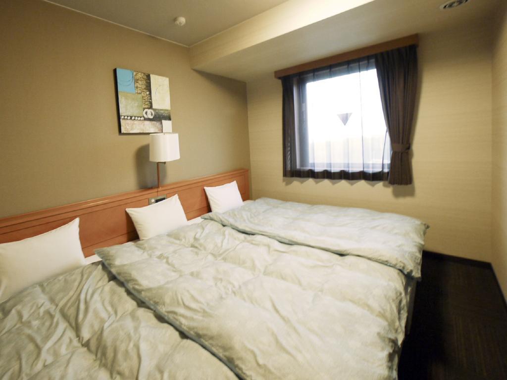 Hotel Route-Inn Yonezawa Ekihigashi Bagian luar foto